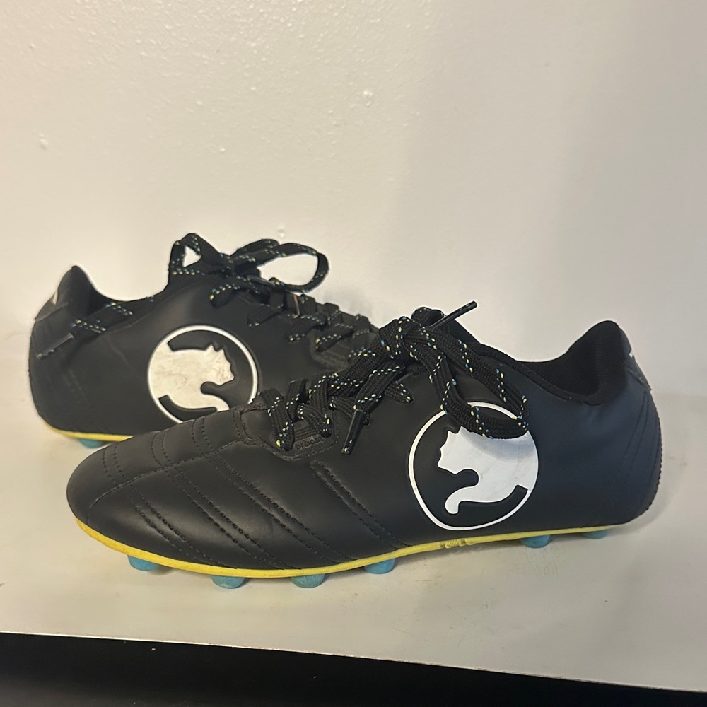 Puma Black Soccer Cleats with White Tag